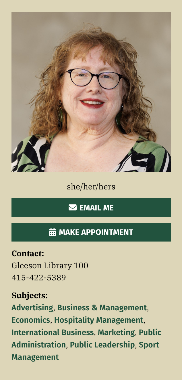 Screenshot of the library staff profile page for Penny Scott, she/her/hers. A headshot shows her smiling, with shoulder-length curly hair, dark-framed glasses, and a green and black patterned top. Below are buttons to email her and to make an appointment, her contact details of Gleeson Library 100 and 415-422-5389, and her subject areas: advertising, business and management, economics, hospitality management, international business, marketing, public administration, public leadership, and sport management.