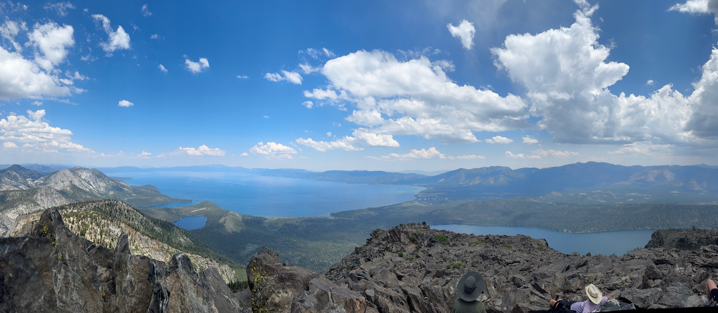 A photo taken at the top of Mount Tallac in Tahoe, California overlooking Lake Tahoe, Fallen Leaf Lake, Emerald Bay, and surrounding wilderness.
